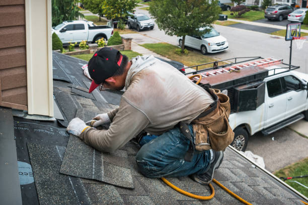 Professional Flat Roof Repair technician working in Spraggs, PA
